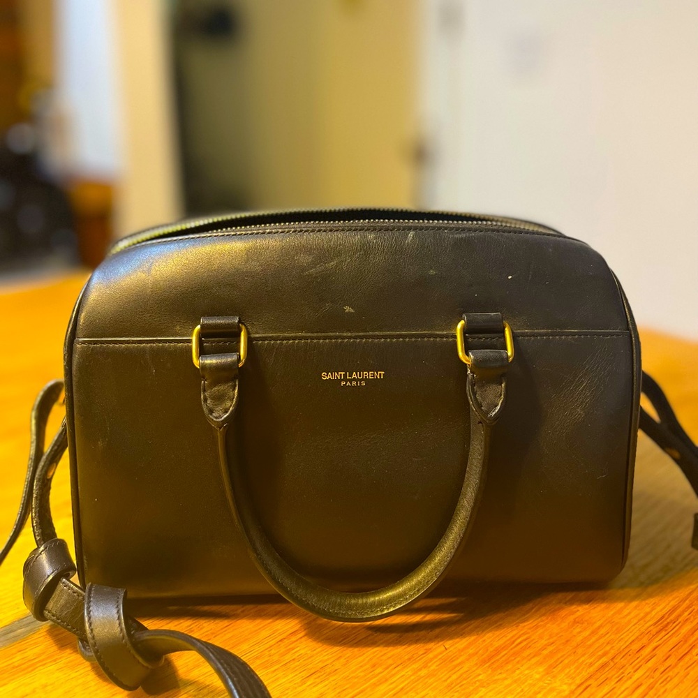 Bought in 2014 from Selfridges. Marks of use on the bag and the strap.